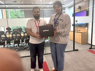 upGrad Mumbai office - student and parents with the counselling team after their study abroad session